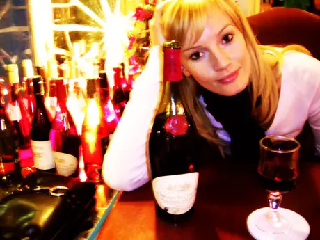 blonde girl wine bar many bottles romantic