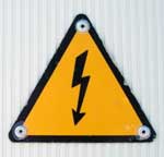 electric warning sign on corrugated white